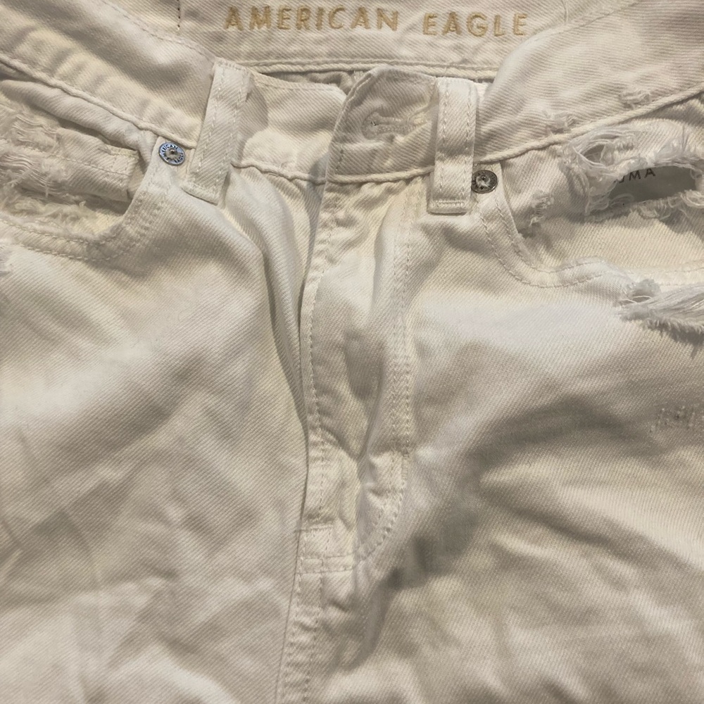 American Eagle white ripped mom jeans